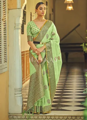 Green Copper Zari Embellished Tissue Silk Saree