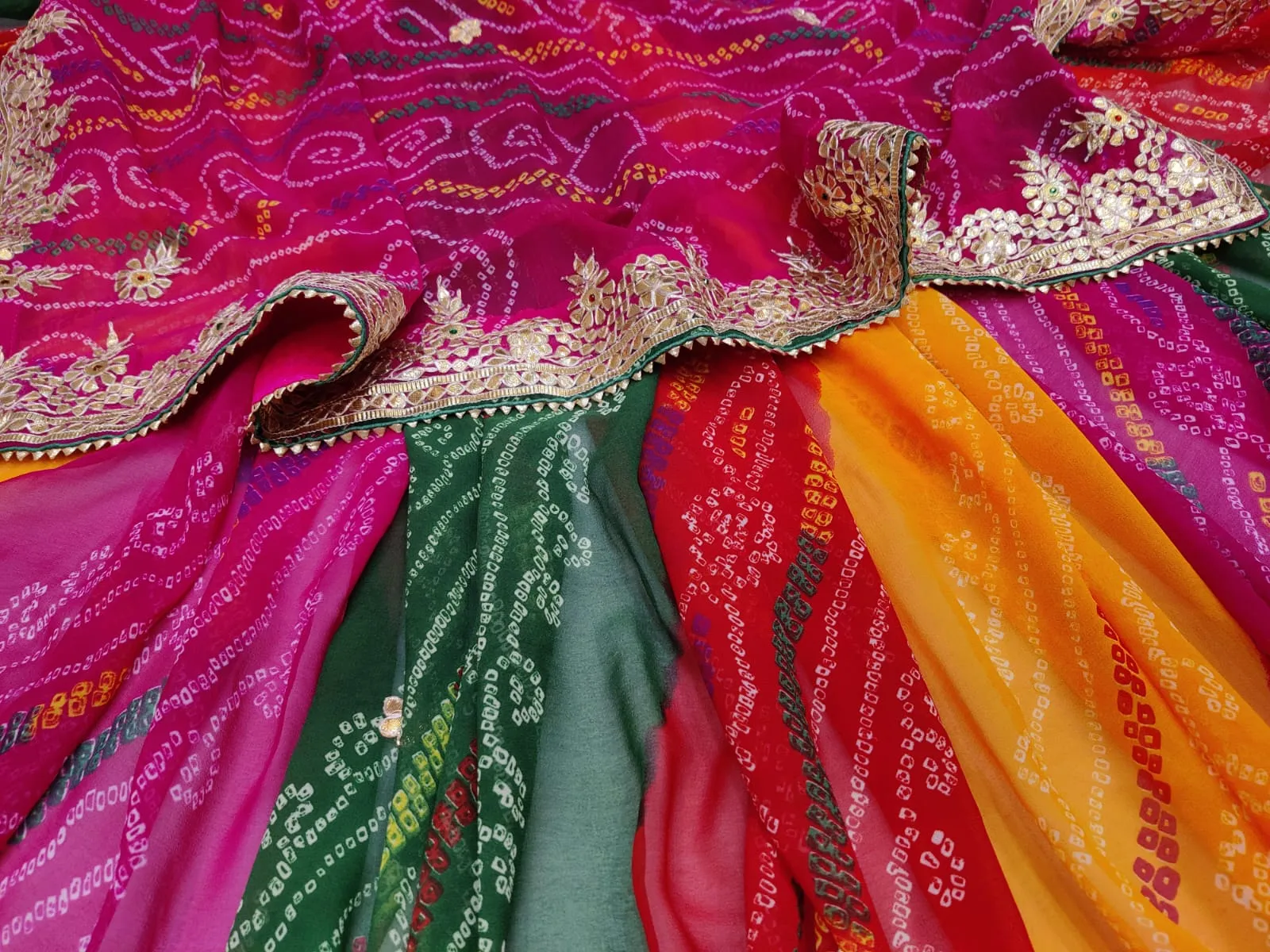 Traditional multicolor Bandhej Sarees In Gota Work